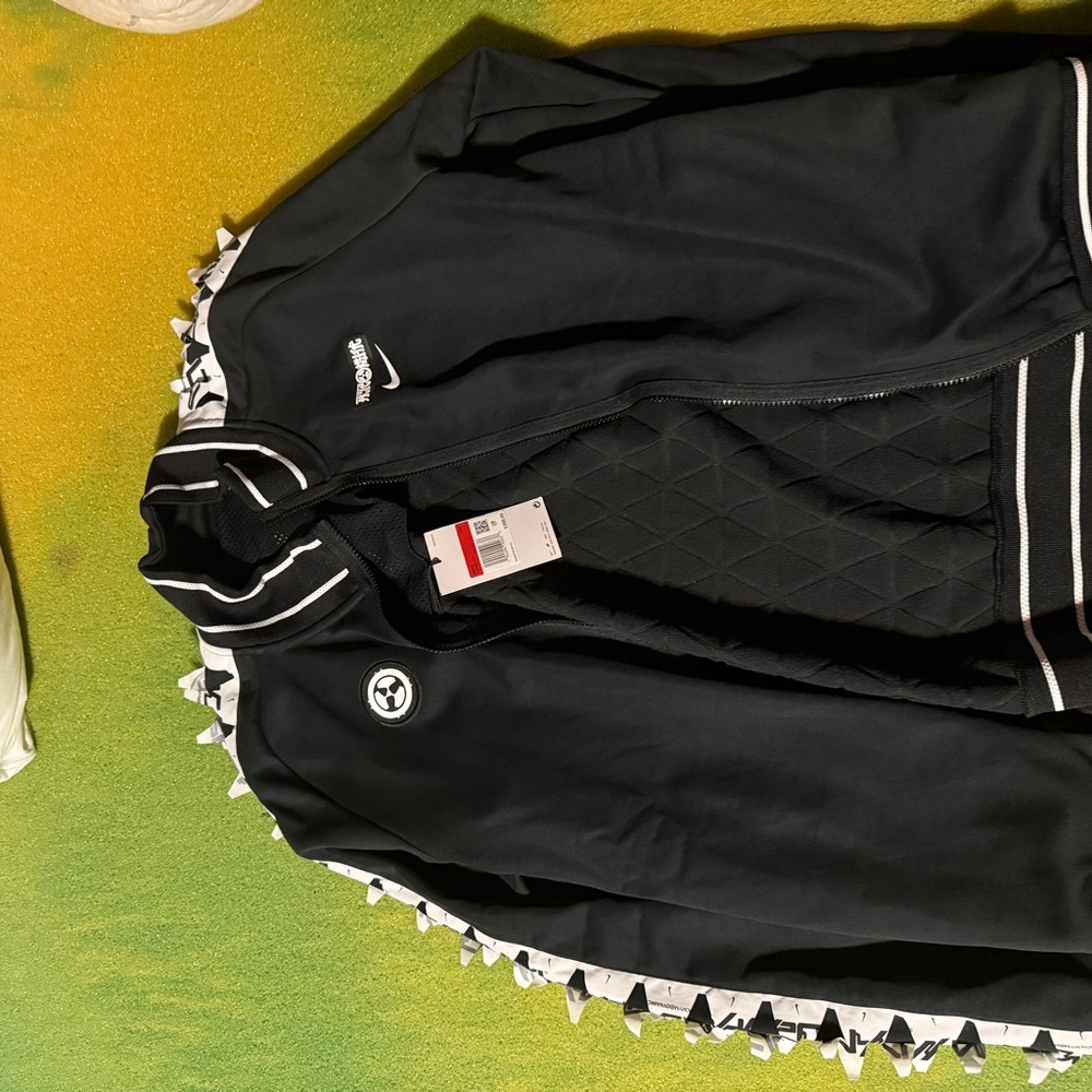 Nike Black Jacket with White Trim and Ruffle Accents